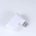 Black and white USB hub splitter with multiple USB ports for computer expansion
