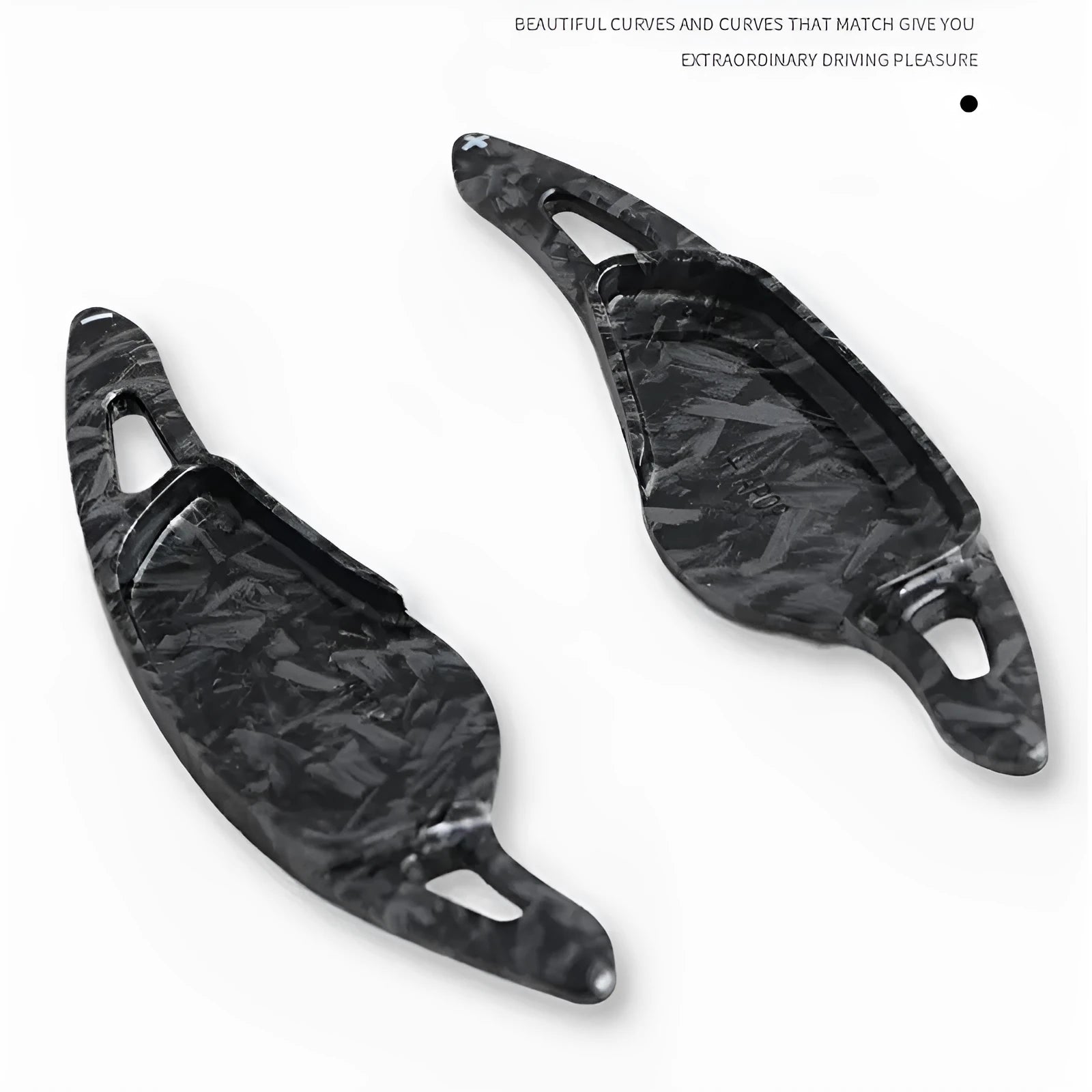 Steering wheel shift paddle modification kit in ABS plastic showing carbon fibre black and red finish options.
