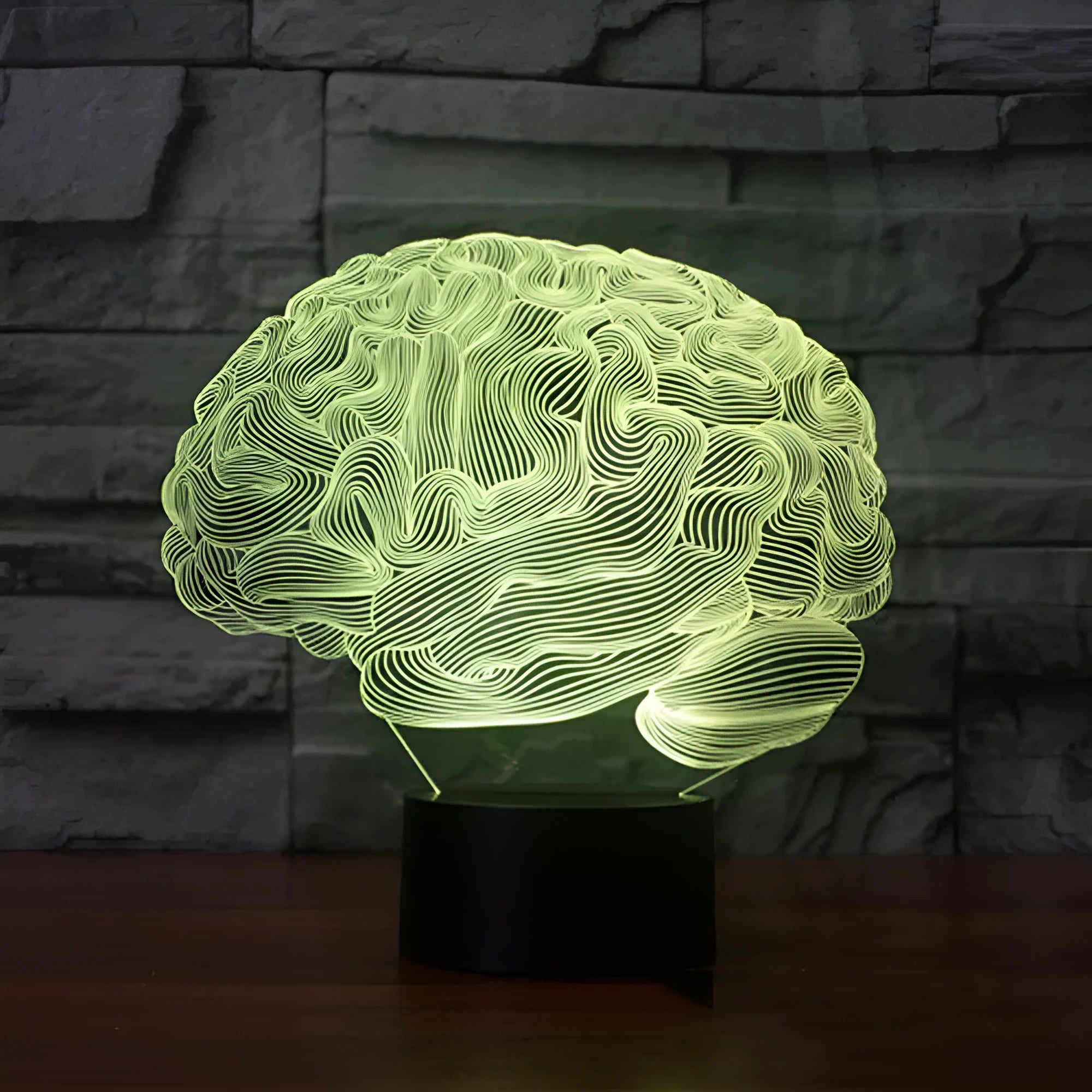 3D brain design acrylic illusion lamp with LED lights on a black ABS base, showing colourful light projection.