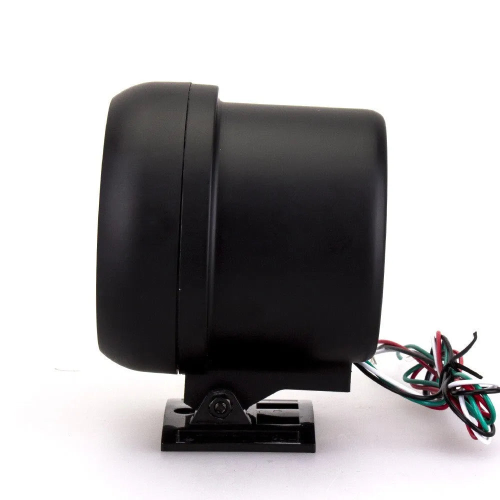 Black automotive tachometer with blue-lit dial showing RPM scale up to 8000