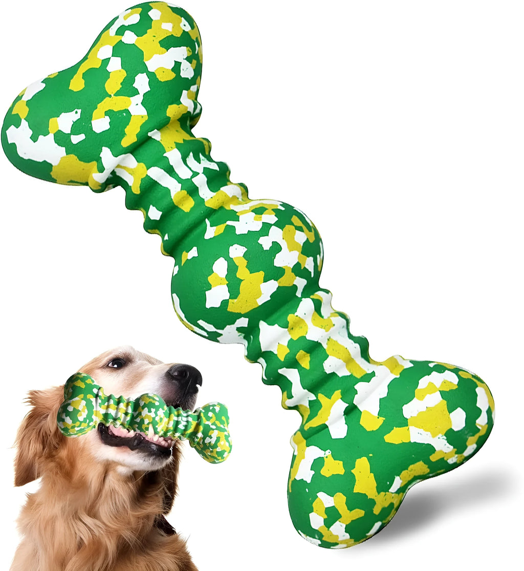 Green and white camouflage patterned natural rubber bone-shaped dog chew toy for large dogs on a wooden floor.