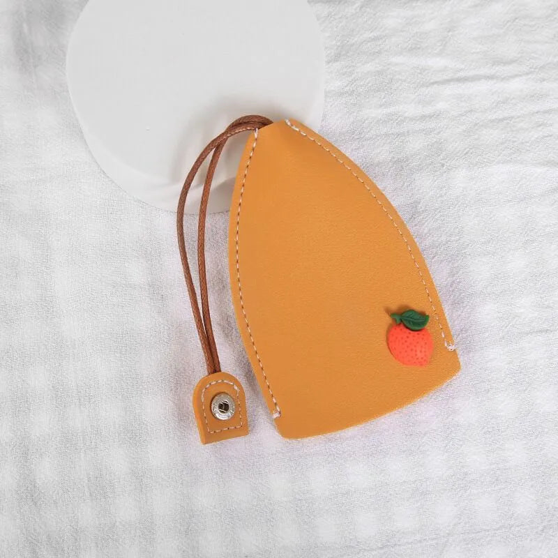 Colourful cartoon pull-out key case made from PU leather showing design options