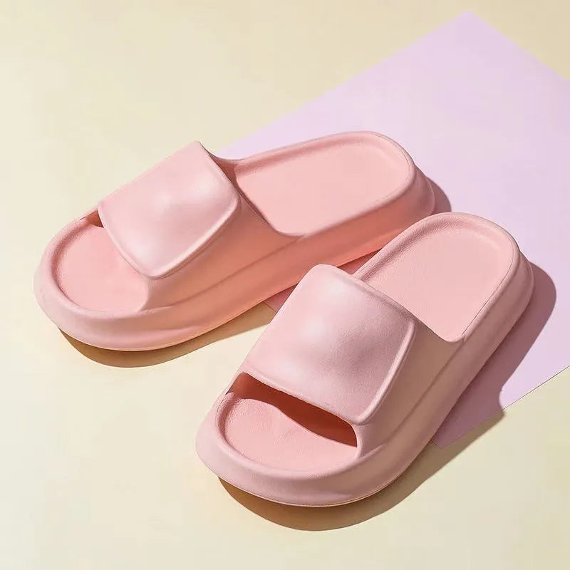 Thick-soled EVA flip-flop slippers in various colours on a white background.