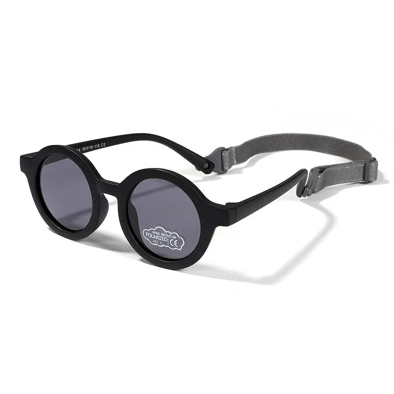 Soft silicone round-frame sunglasses for babies and toddlers aged 0-3 years with polarised UV400 lenses.
