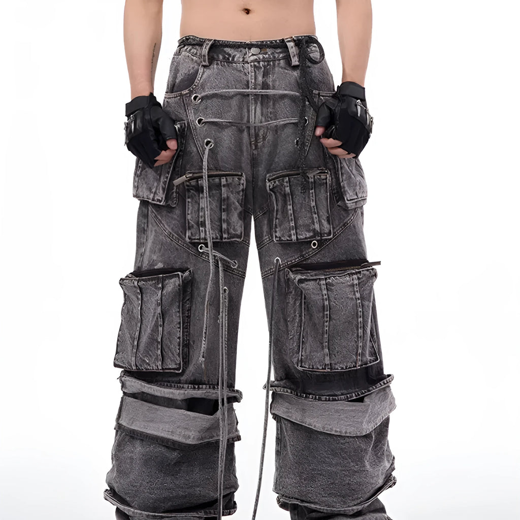 Grey distressed denim overalls with rope stitching and mop pant design on male model