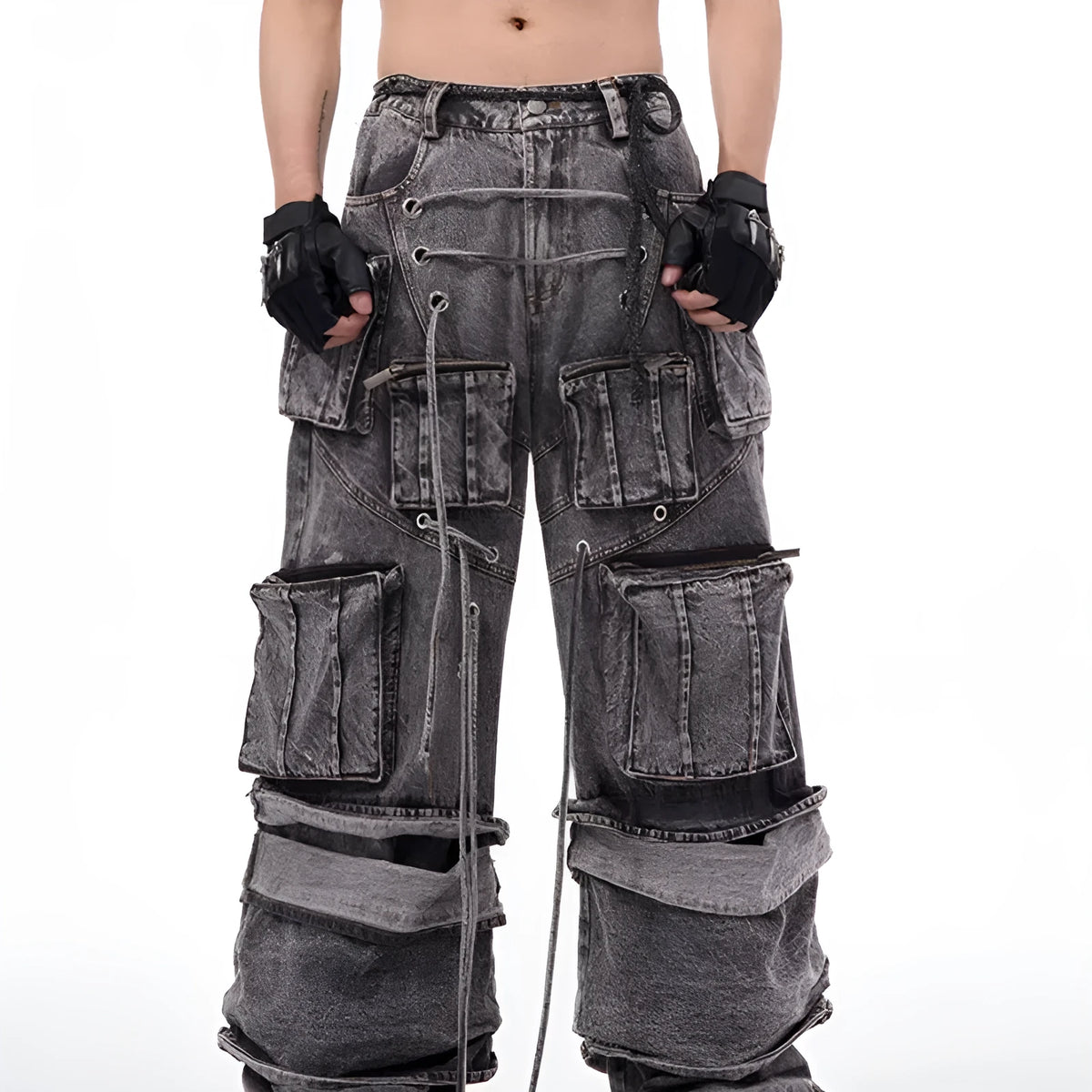 Grey distressed denim overalls with rope stitching and mop pant design on male model