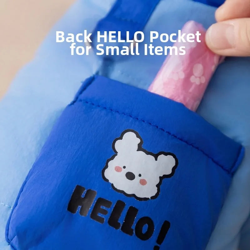 Blue padded dog snowsuit with hood, bear print pocket and metal leash ring for small dogs and cats