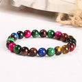 Colourful Tiger Eye stone bracelet with round beads on a mixed string, showing available sizes.