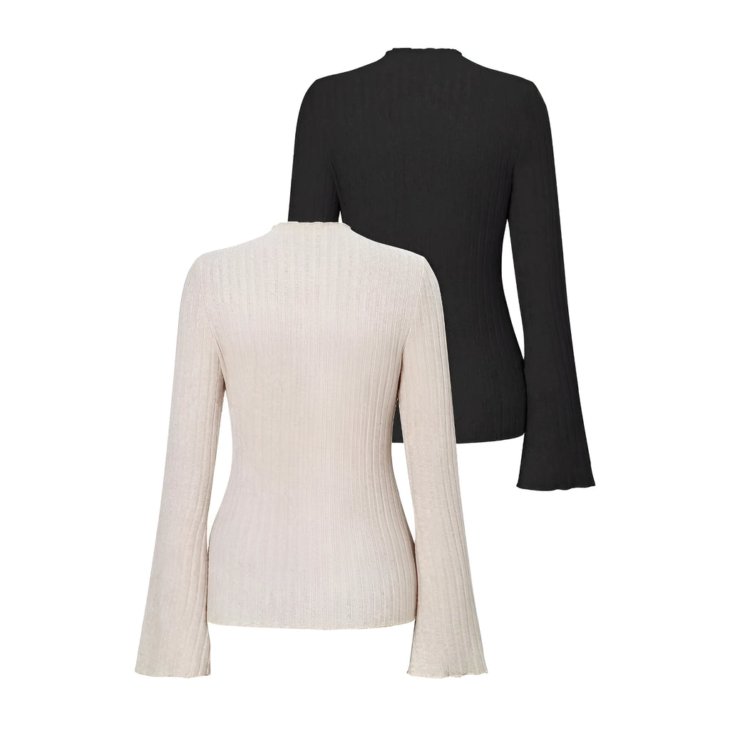Man wearing a slim-fit long sleeve black top with a subtle brushed stripe texture and round neck.