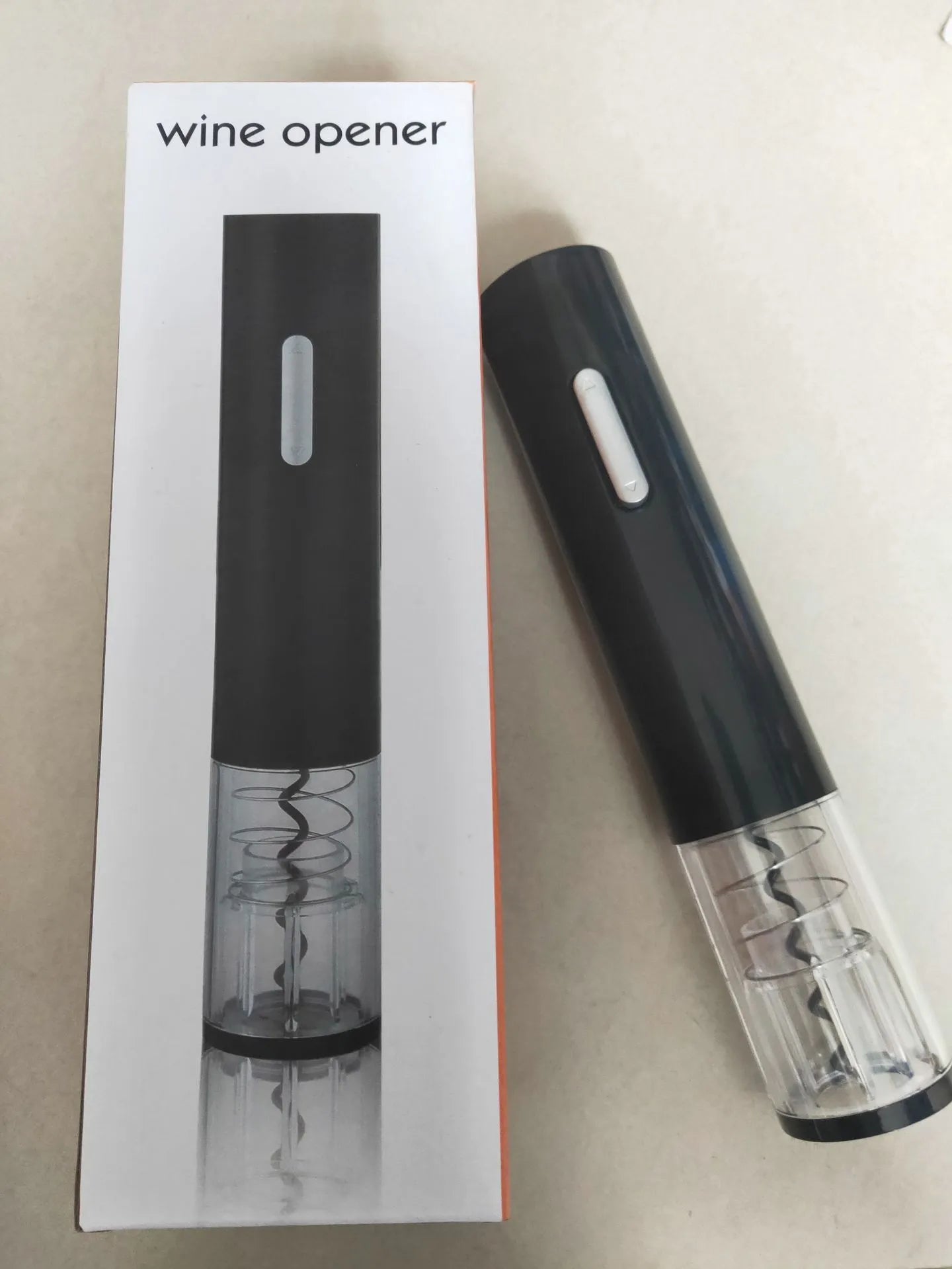 Automatic electric wine bottle opener with foil cutter in red, black, and white colour options.