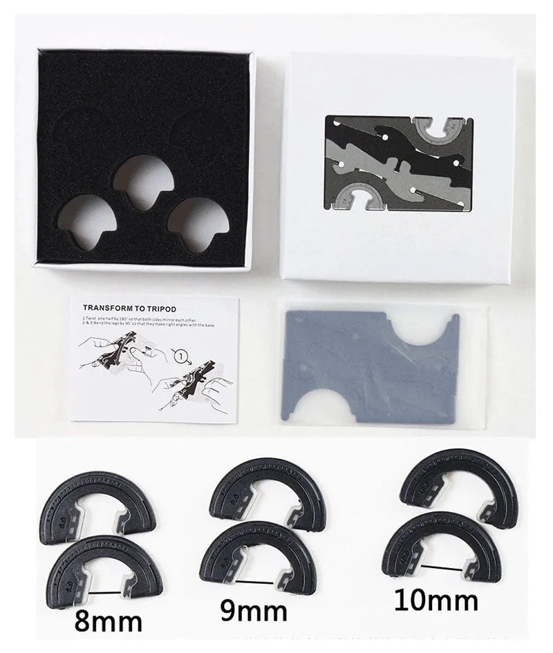 Black foldable ABS plastic mobile phone holder bracket stand on a desk