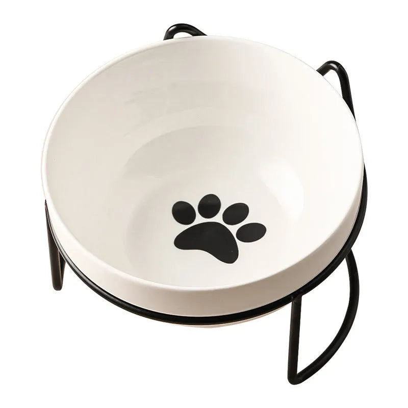 White ceramic cat bowl with cat paw design in black iron frame