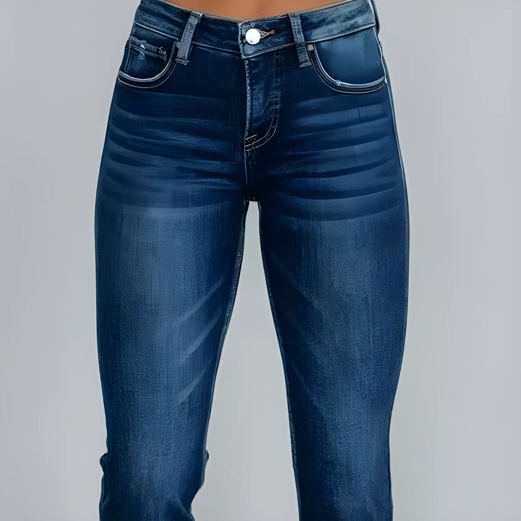 Women's solid colour denim jeans with a hand-worn finish in dark blue and light blue options.