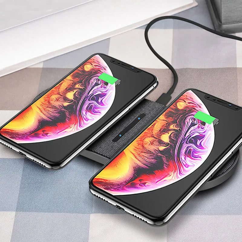 Black wireless charger pair with two charging pads for simultaneous phone and earbuds charging