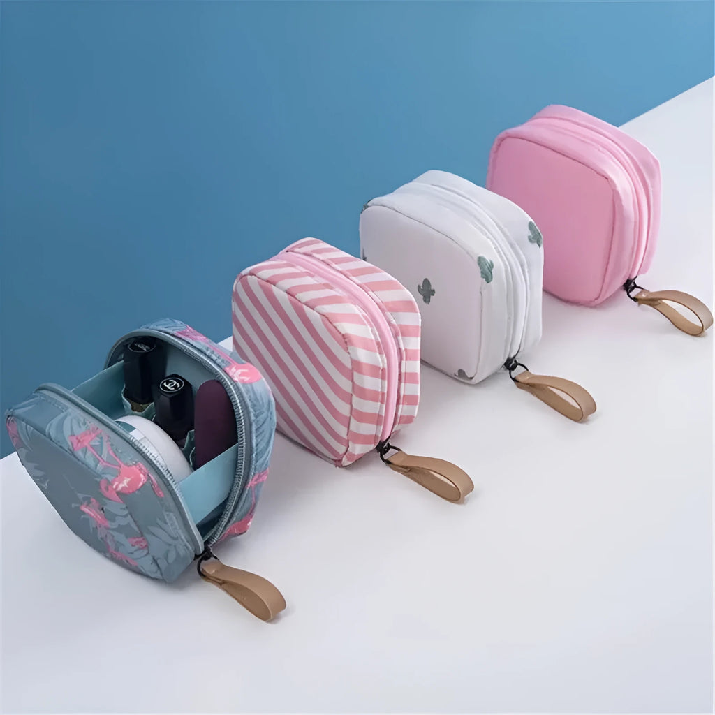 Plain cloth cube-shaped makeup storage bag shown in blue, pink, white, and white-pink colour options.