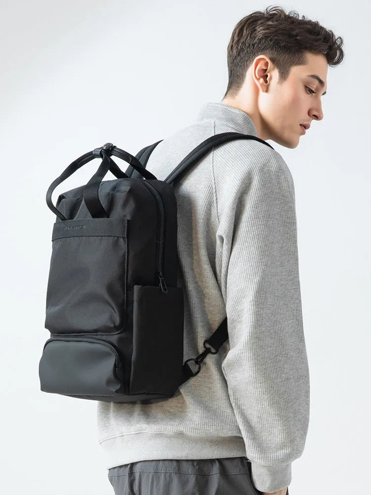 Black Oxford cloth computer backpack with 20-35L capacity and polyester lining