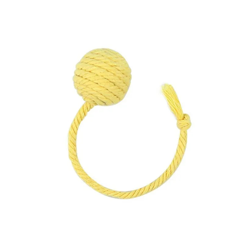Colourful cat toy ball with rope attachment and internal bell for interactive kitten play