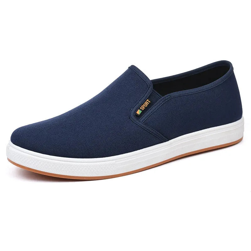 Men's black canvas slip-on shoes with round toe and shallow mouth design