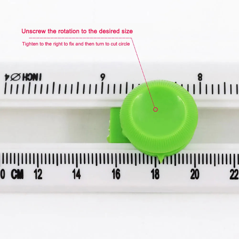 Green or orange plastic A3 round paper cutter for juvenile use.