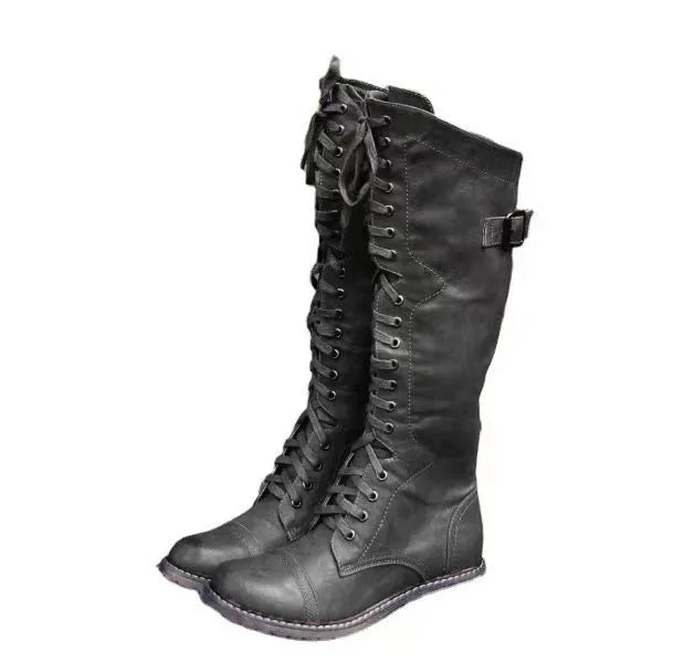 Women's black casual high leg boots with a chunky low heel and round toe