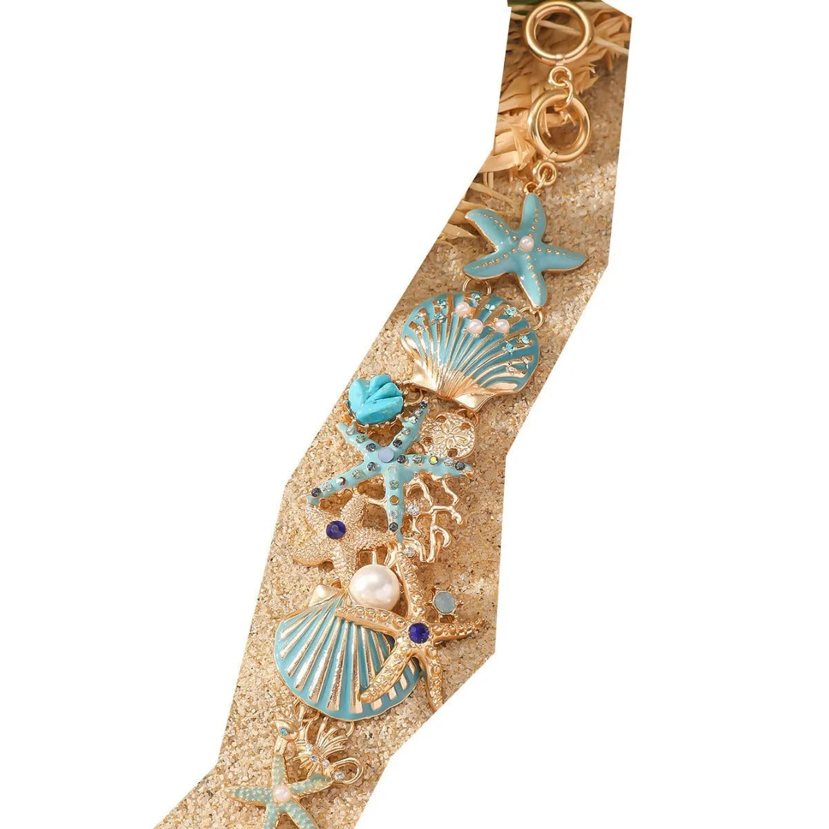 Women's alloy rhinestone marine shell and anchor bracelet with starfish charm in turquoise colour.