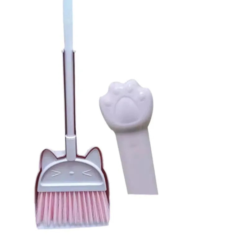 Purple plastic broom and dustpan set with rotating brush head and integrated storage holder