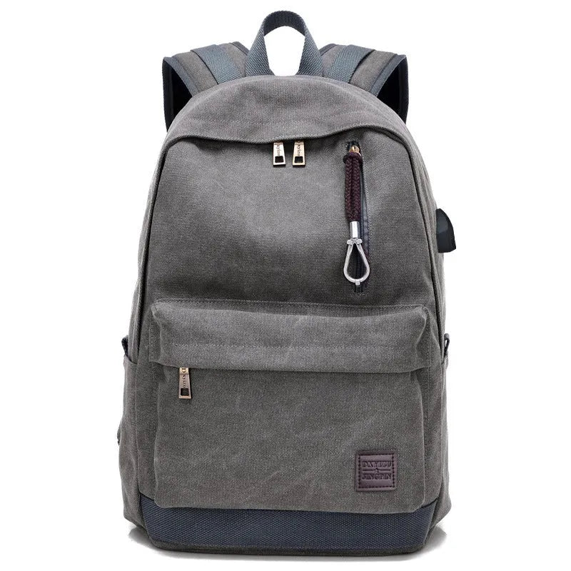 Canvas backpack with USB charging port and shoulder straps in khaki colour.