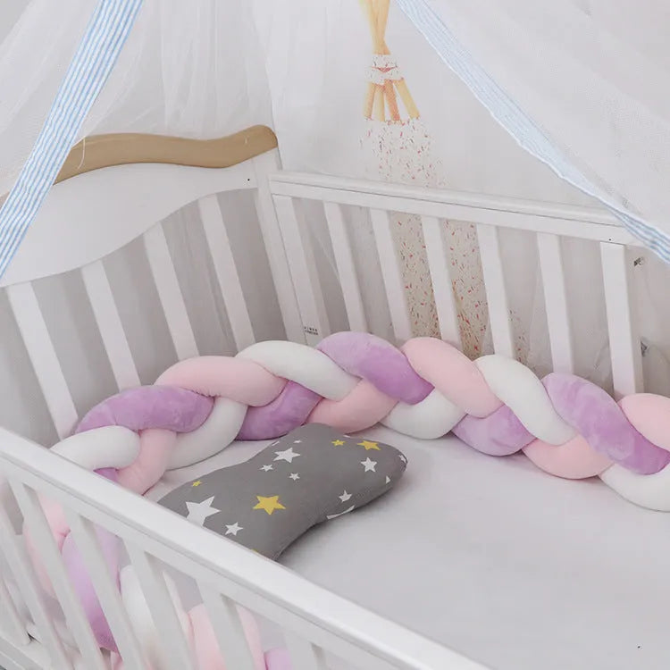 Braided knot cot bumper cushion in spandex velvet for crib safety protection.