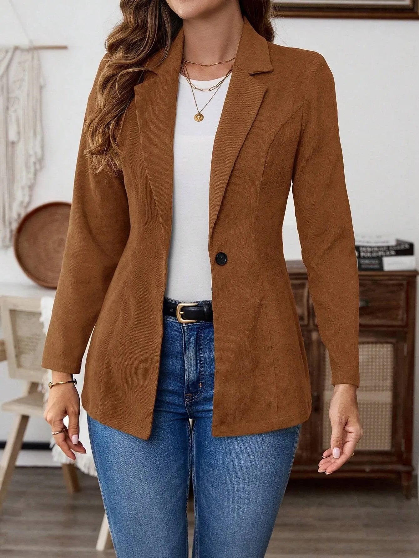 Brown men's lapel long sleeve single-breasted leisure suit coat hanging