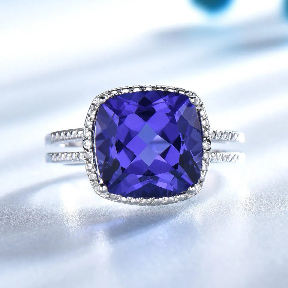 Women's sterling silver ring with a blue Tanzanite gemstone, shown in size 10.