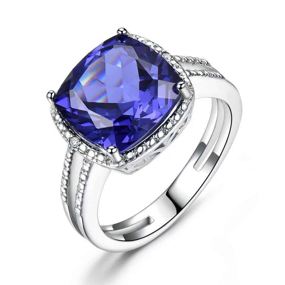 Women's sterling silver ring with a blue Tanzanite gemstone, shown in size 10.