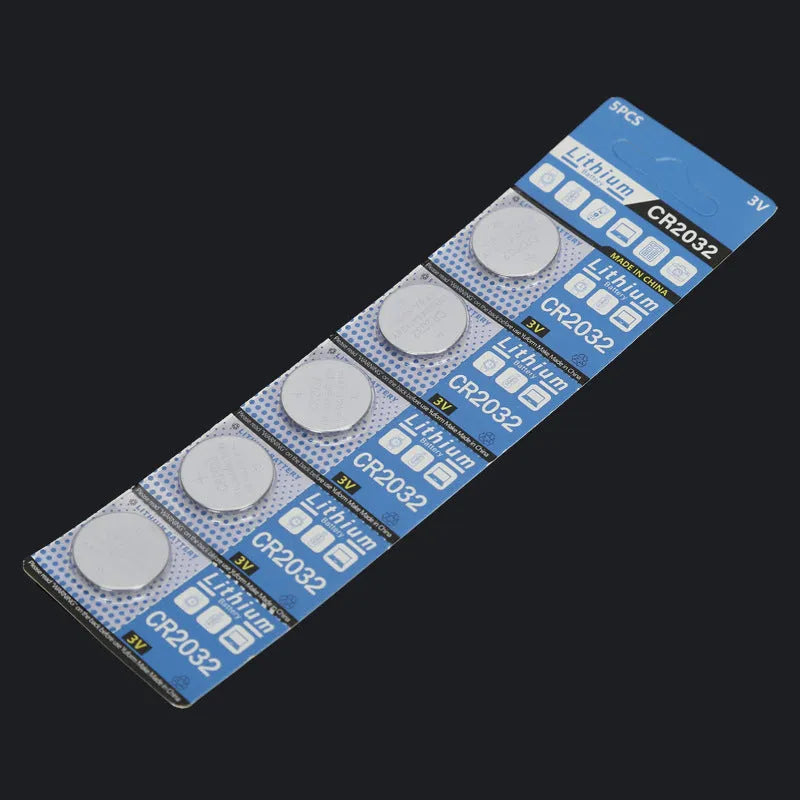 A card of five round, silver CR2032 3V lithium button batteries.