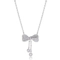 Silver bow necklace on adjustable chain showing pendant detail and polished finish