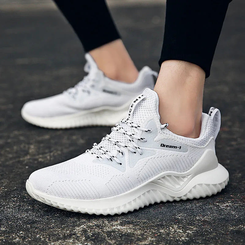 Low-top men's running shoe with mesh upper, front strap, and MD sole in multiple colour options.