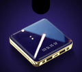Compact blue 20000mAh power bank with aluminium shell and multiple USB ports on a white background.