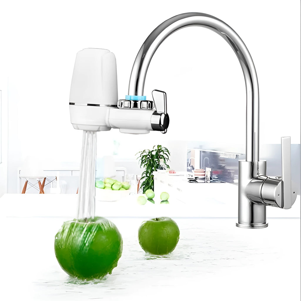 White plastic faucet water filter with adapter kit and ceramic cartridge for kitchen tap installation.