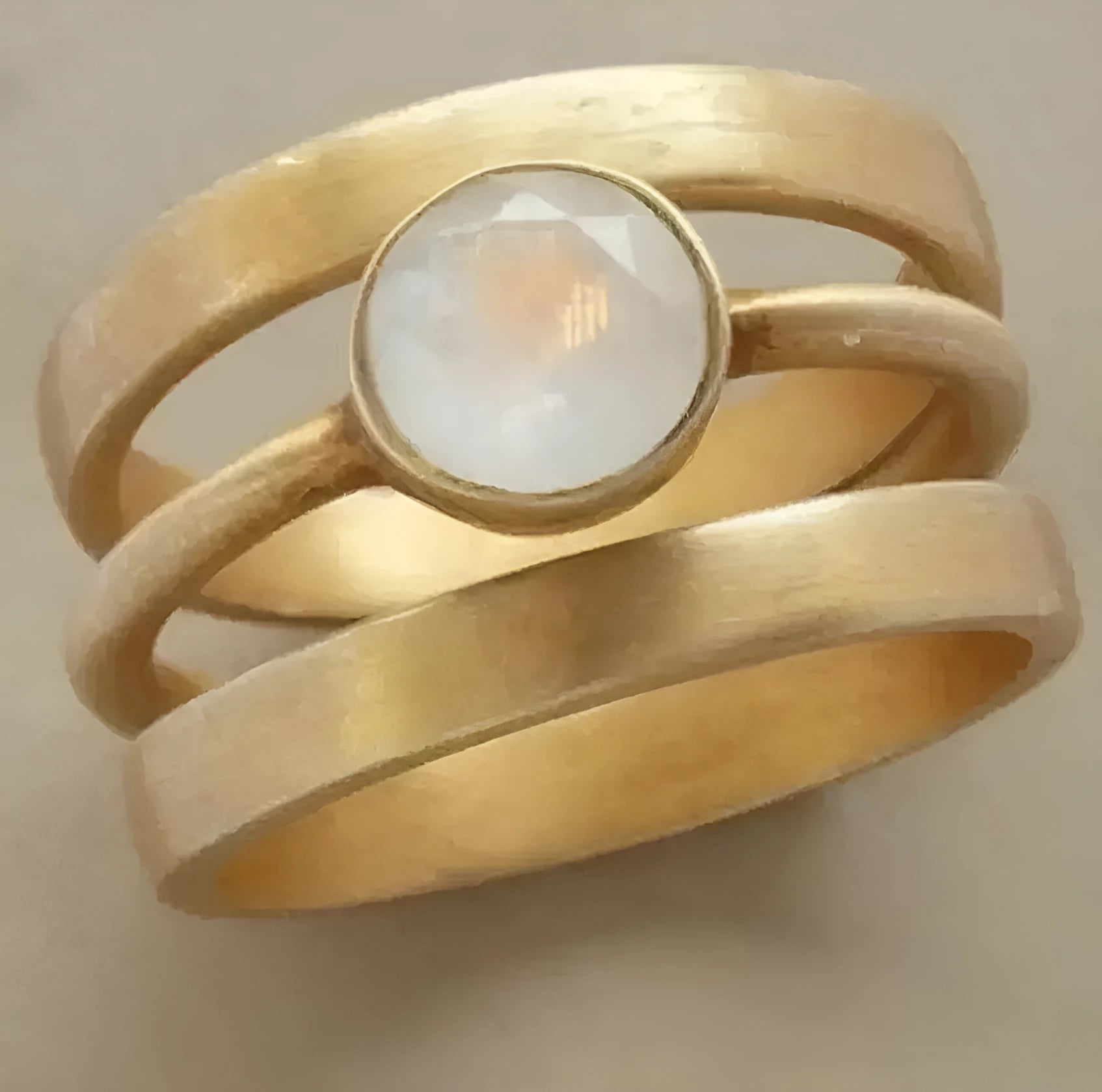 Gold-plated titanium steel ring with hollow micro-inlaid white chalcedony in geometric design