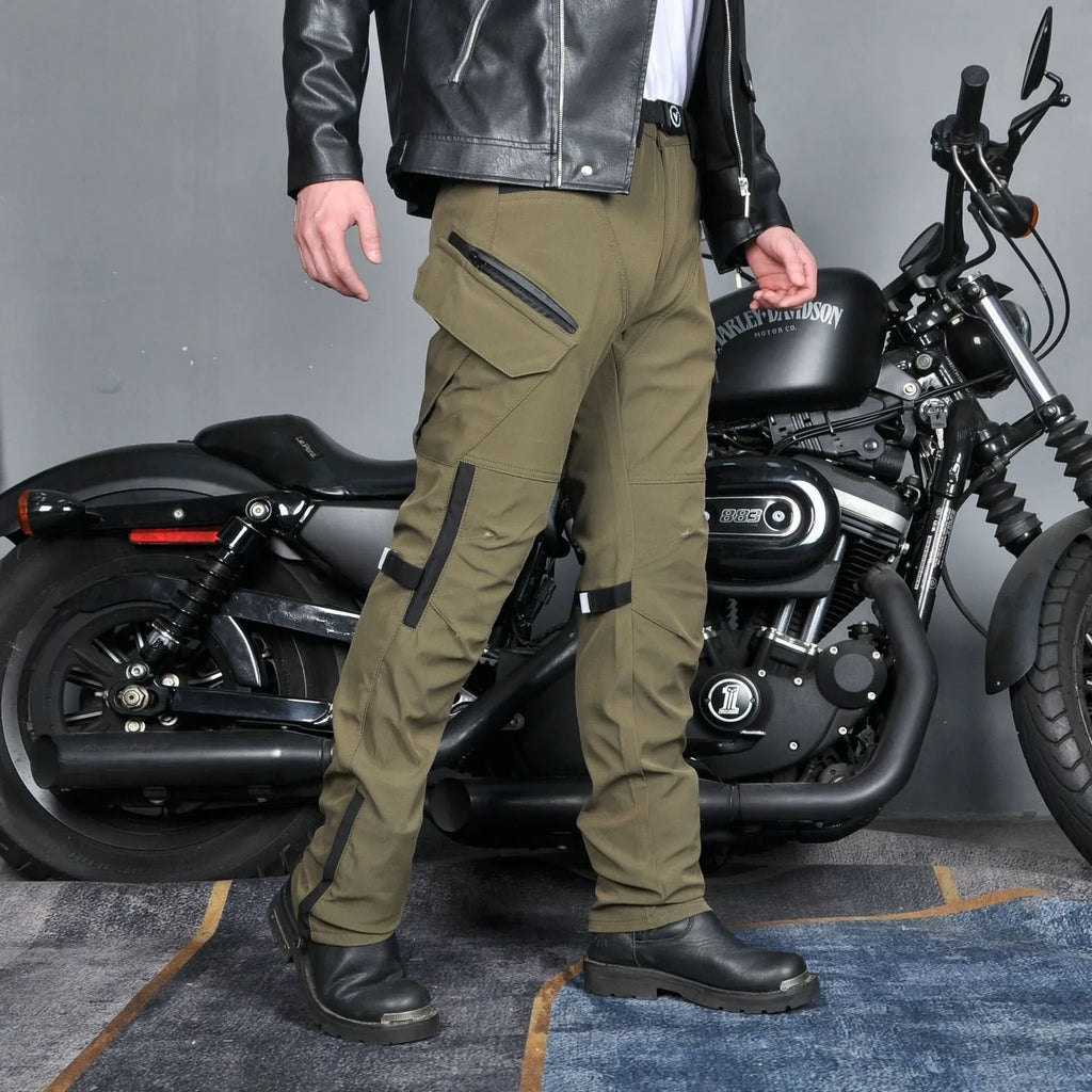 Men's black waterproof motorcycle cycling trousers with protective gear on a mannequin