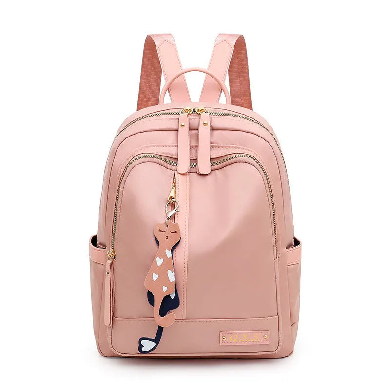 Women's black casual nylon backpack with multiple pockets and soft shoulder straps