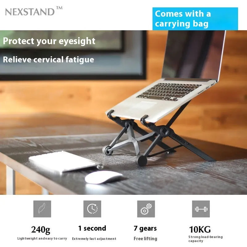 Sagacious black portable folding laptop stand on a wooden desk next to a laptop.