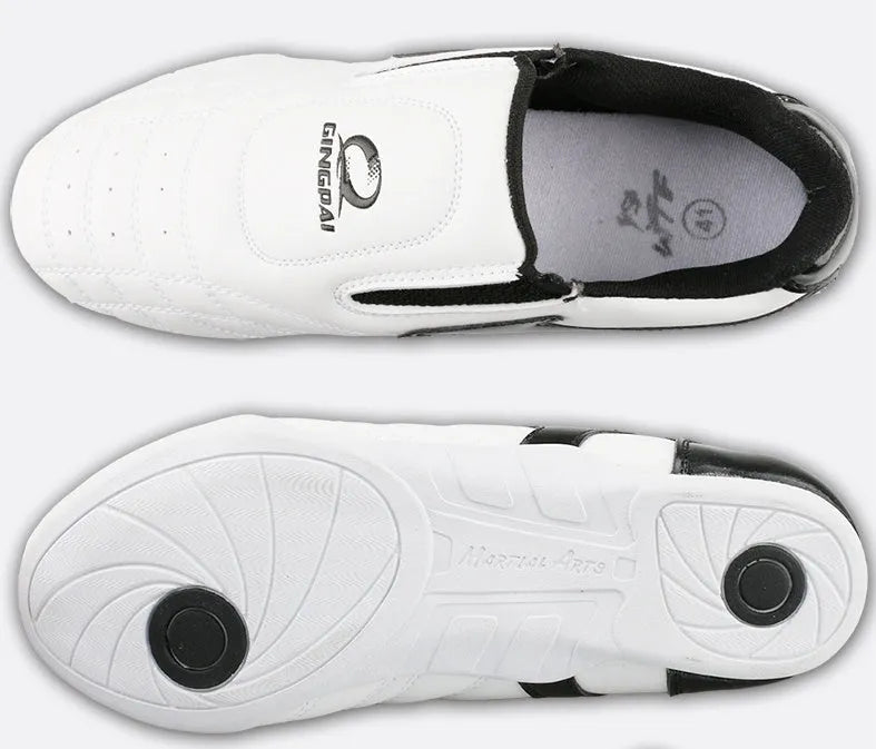 Black and white children's martial arts training shoes with soft bottom and widened design
