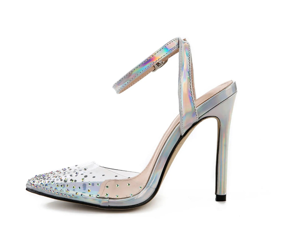 Women's pointed toe stiletto sandals with diamond ornamentation on a PVC upper.