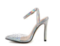 Women's pointed toe stiletto sandals with diamond ornamentation on a PVC upper.