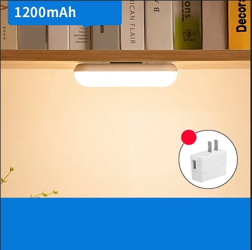 Compact white magnetic LED desk lamp with stepless dimming on a metal surface.