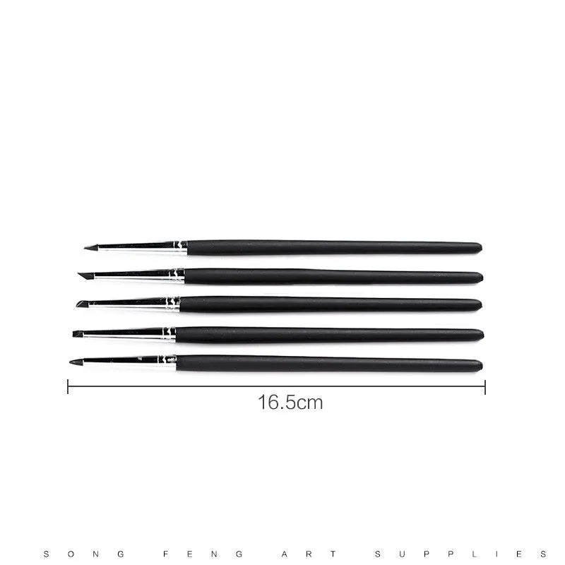 27-piece pottery tool set with stainless steel sculptors and wood tools rolled in a brown package.