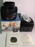 Black wrist blood pressure monitor with USB charging port and multi-language voice options