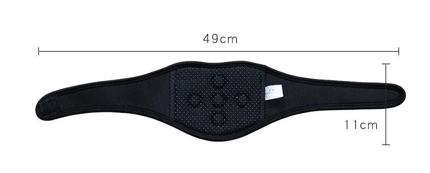 Black self-heating magnetic therapy neck guard with adjustable straps on a flat surface.