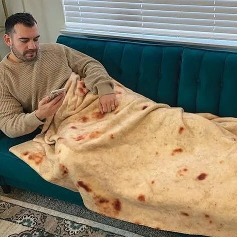 Round shape flannel burrito blanket with food-themed printing showing coral fleece texture