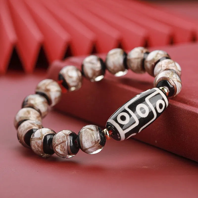 Chinese coloured glaze bracelet with snake beads in five-colour design, showing manual processing details