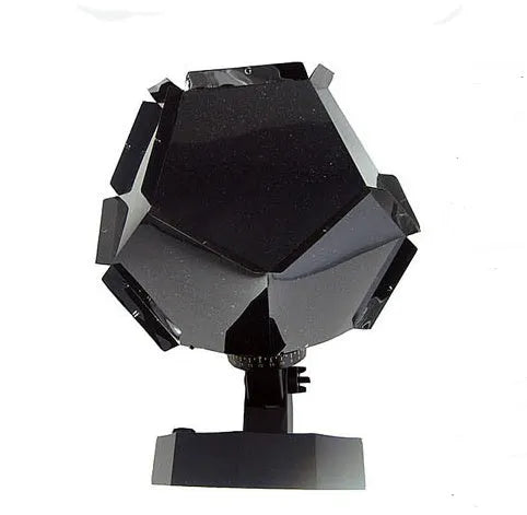 LED starry sky night light projector showing constellation projection on a bedroom ceiling.